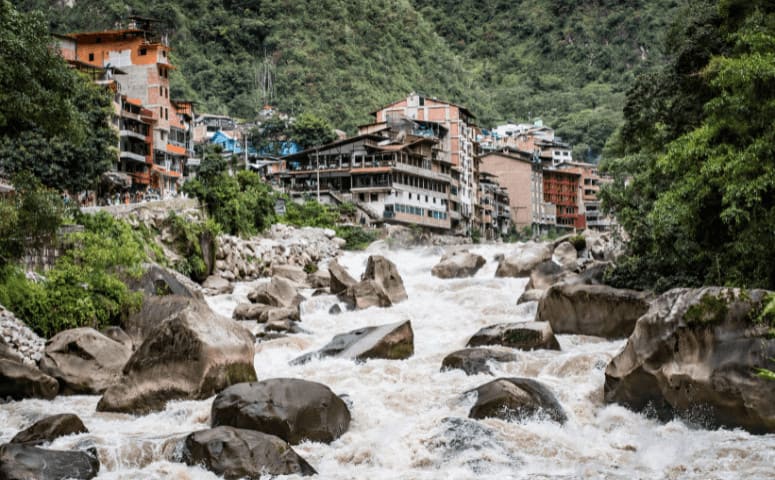 Visiting Machu Picchu - 10 Things to Know Before Visiting Machu Picchu Aguas Calientes near Machu Picchu Mountain in Peru.