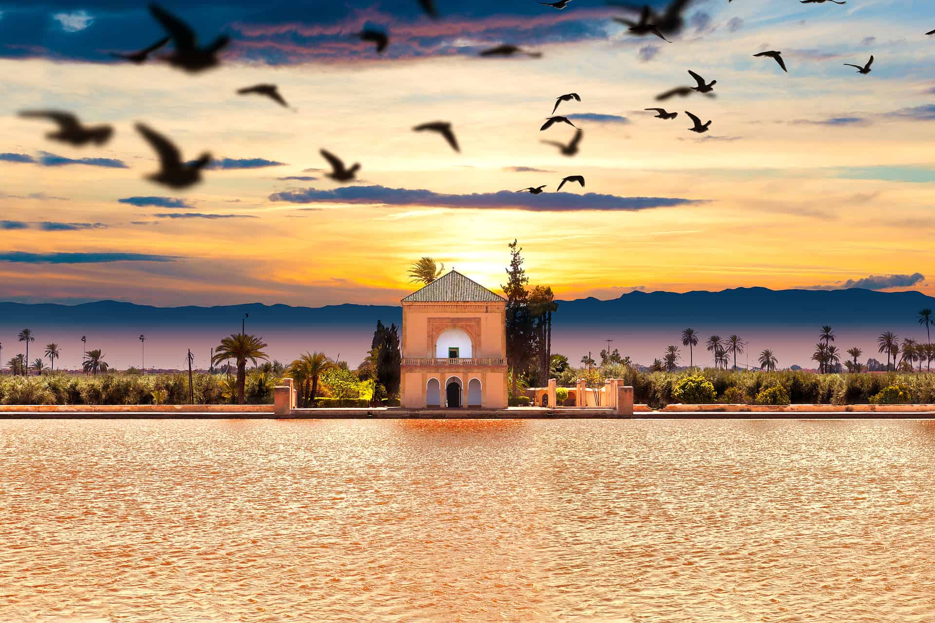Places to Visit in Marrakech - Not to Miss Cultural & Historic Places to Visit in Marrakech Menara Palace in Marrakech, Morocco.