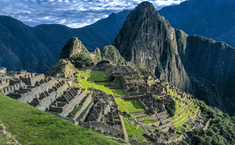 Peru Itinerary - How to Structure Your Peru Itinerary Ruins of Machu Picchu in Peru.