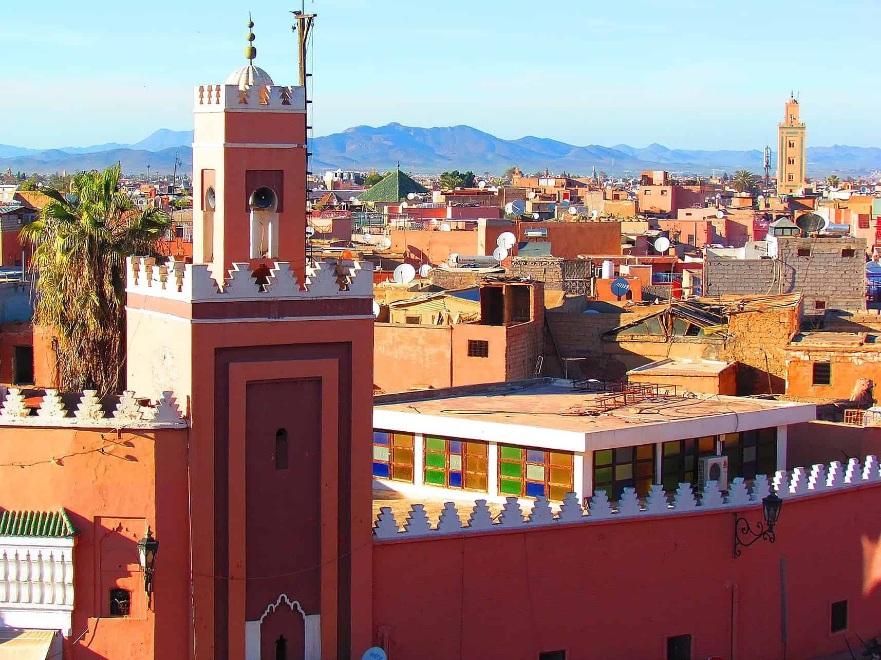 Places to Visit in Marrakech - Not to Miss Cultural & Historic Places to Visit in Marrakech Mosque with minaret in Marrakech, Morocco.