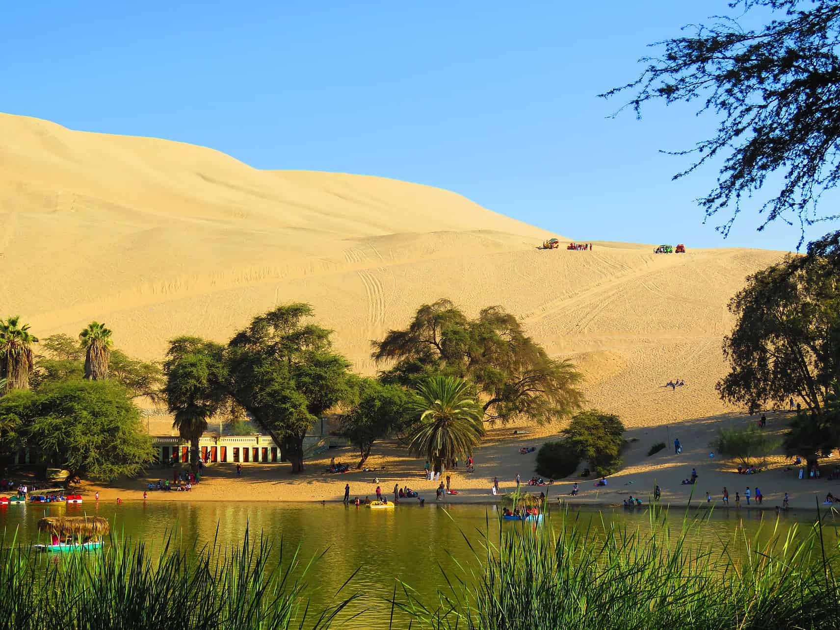 Peru Itinerary - How to Structure Your Peru Itinerary Oasis Huacachina in Peru.
