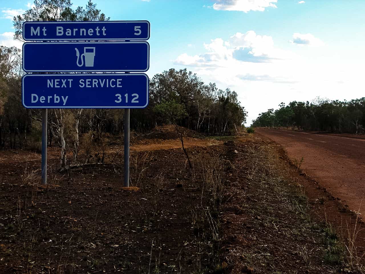 international driving license for australia - Do I Need an International Driving License for Australia Road service sign on the Gibb River Road in the Kimberley region in Australia.