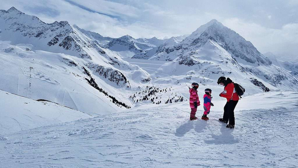 Family skiing in Kuehtai, Innsbruck, Austria.