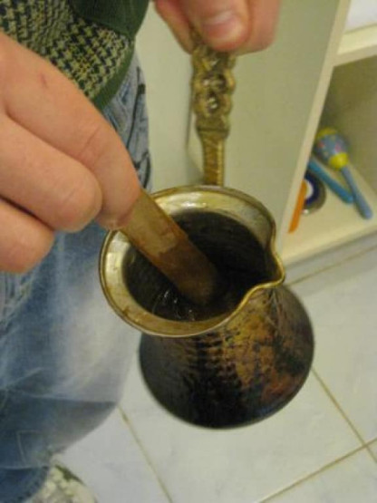 Getting the wax ready in a Turkish barber shop.