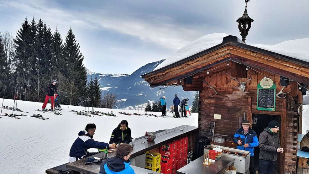 Sausage snack on the piste in St. Johann in Tirol, Austria.