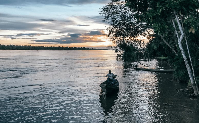 Pink Dolphins in the Amazon - Where to See Pink Dolphins in the Amazon local in boat on amazon river