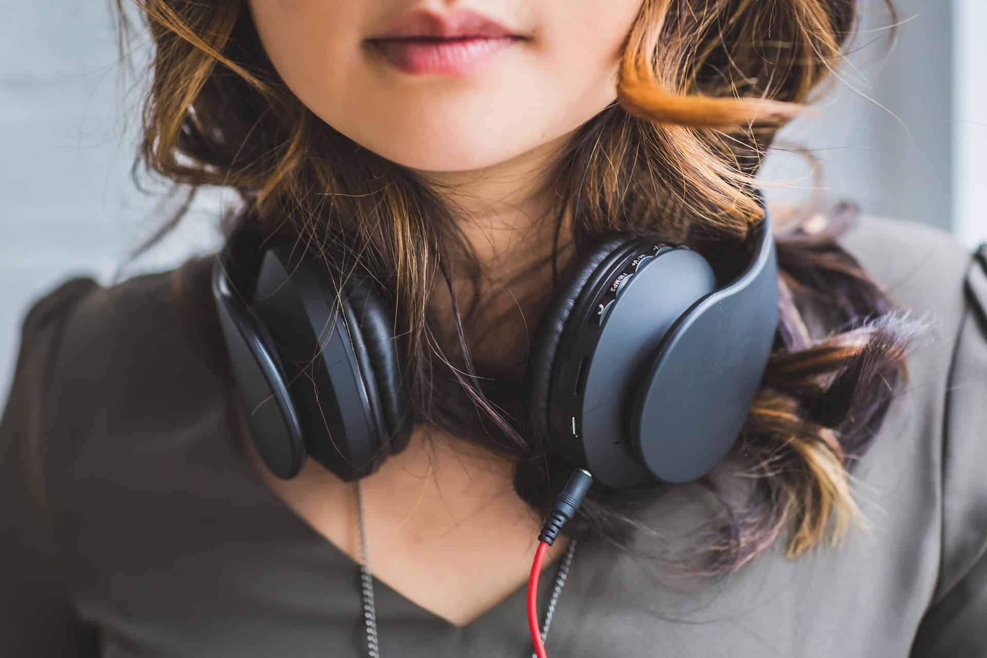 fear of flying - Overcoming Your Fear of Flying: Tips to Transform Your Flight Experience Wearing headphones