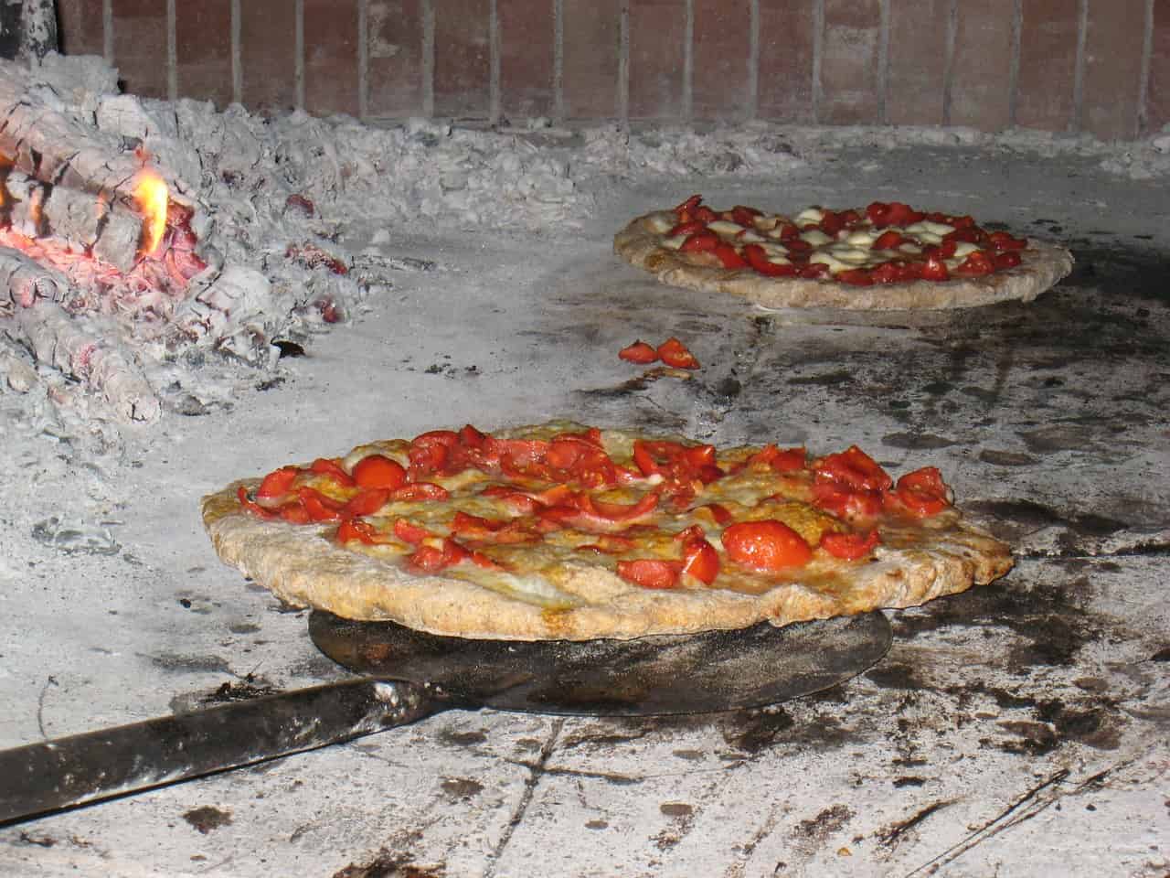 culinary tours - Best Culinary Tours Around The World Wood burned pizza in Naples, Italy